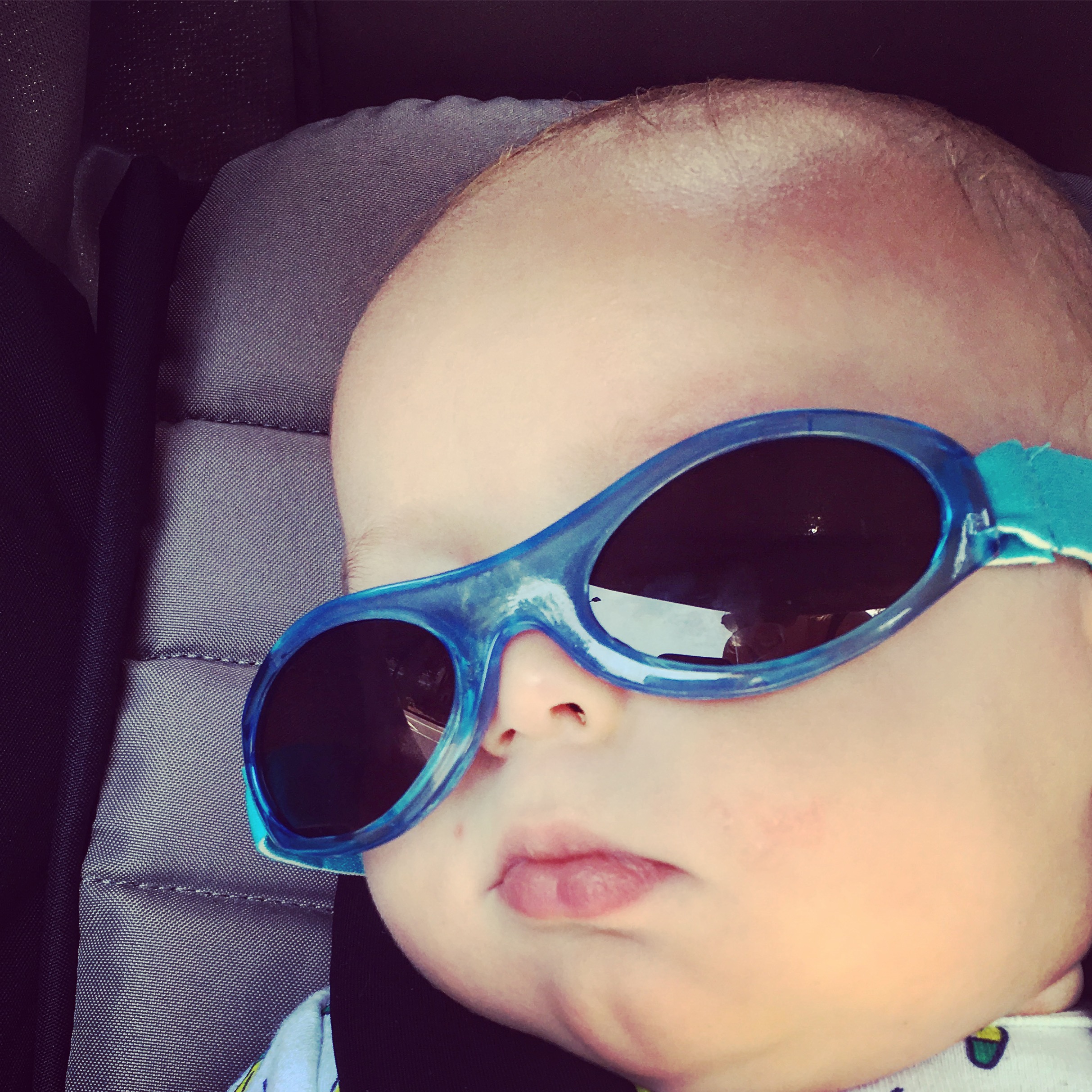 He may be asleep in this picture...I snuck them on (sorry little guy)