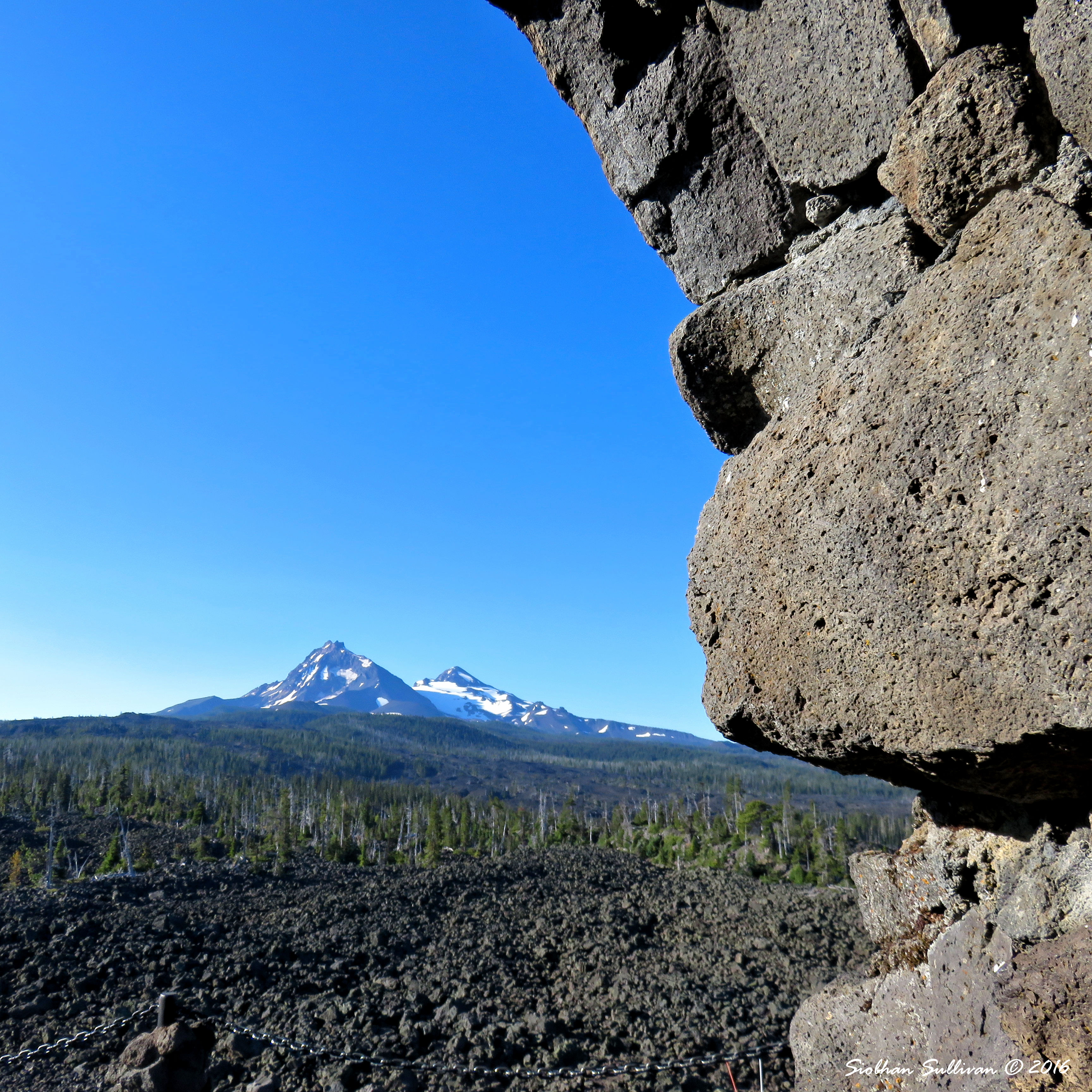 The Sisters from a large viewing window, Dee Wright Observatory