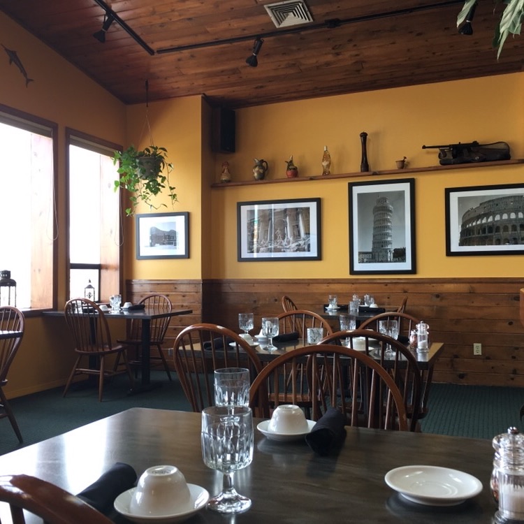 UPSTAIRS DINING - Prints by a former Coos Bay resident on a trip to Italy.