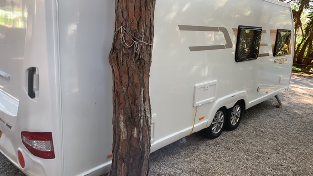 The outside of a Swift touring caravan for sale in Spain