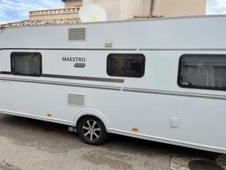 An image of the outside of a LMC touring caravan for sale in Spain
