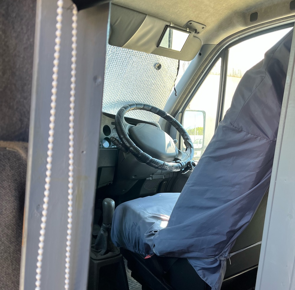 A drivers seat in a campervan for sale in Benidorm, Costa Blanca, Spain