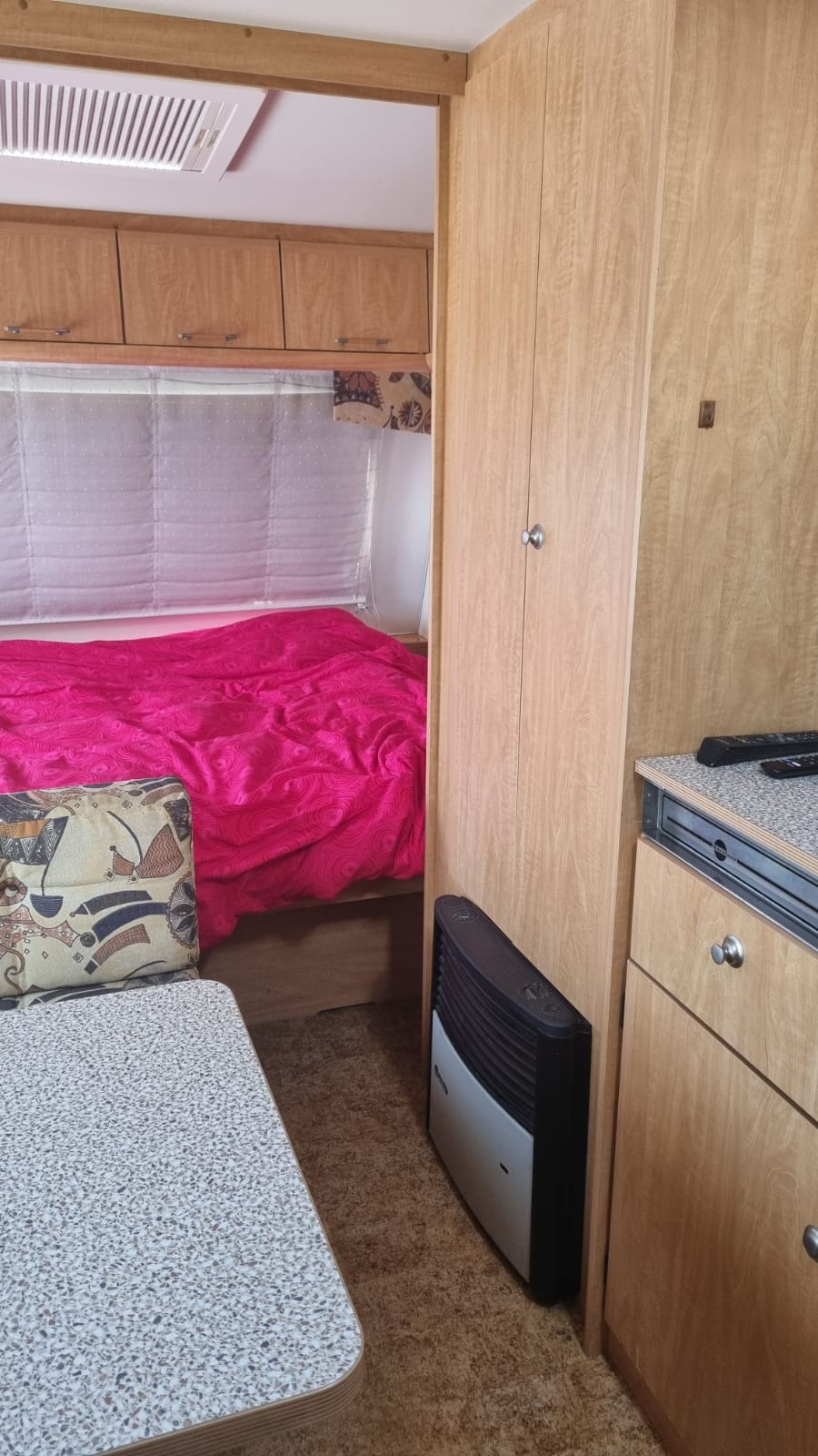 A double bed in a Burstner touring caravan