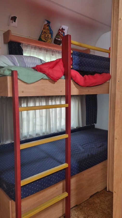 Bunk beds in a Burstner touring caravan on Camping Villasol Campsite in Benidorm