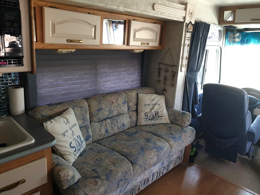 A sofa in a motorhome for sale in Benidorm