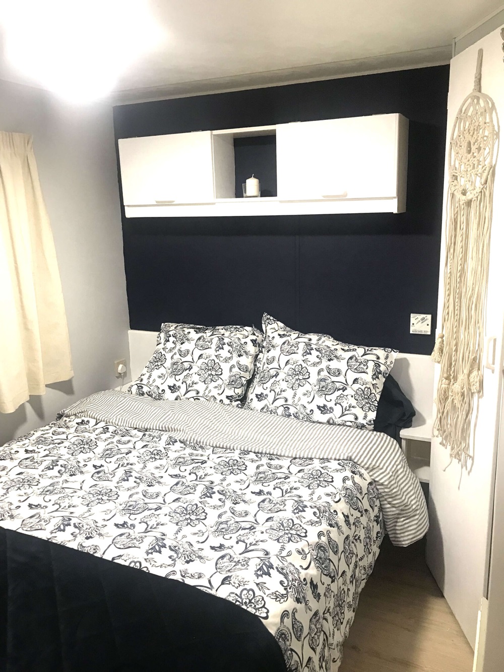 A double bed in a mobile home for sale in Spain