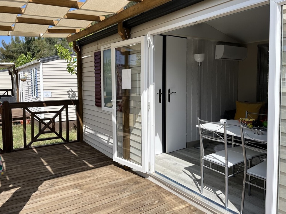 A sunny terrace on a mobile home for sale in El Rocio, Spain