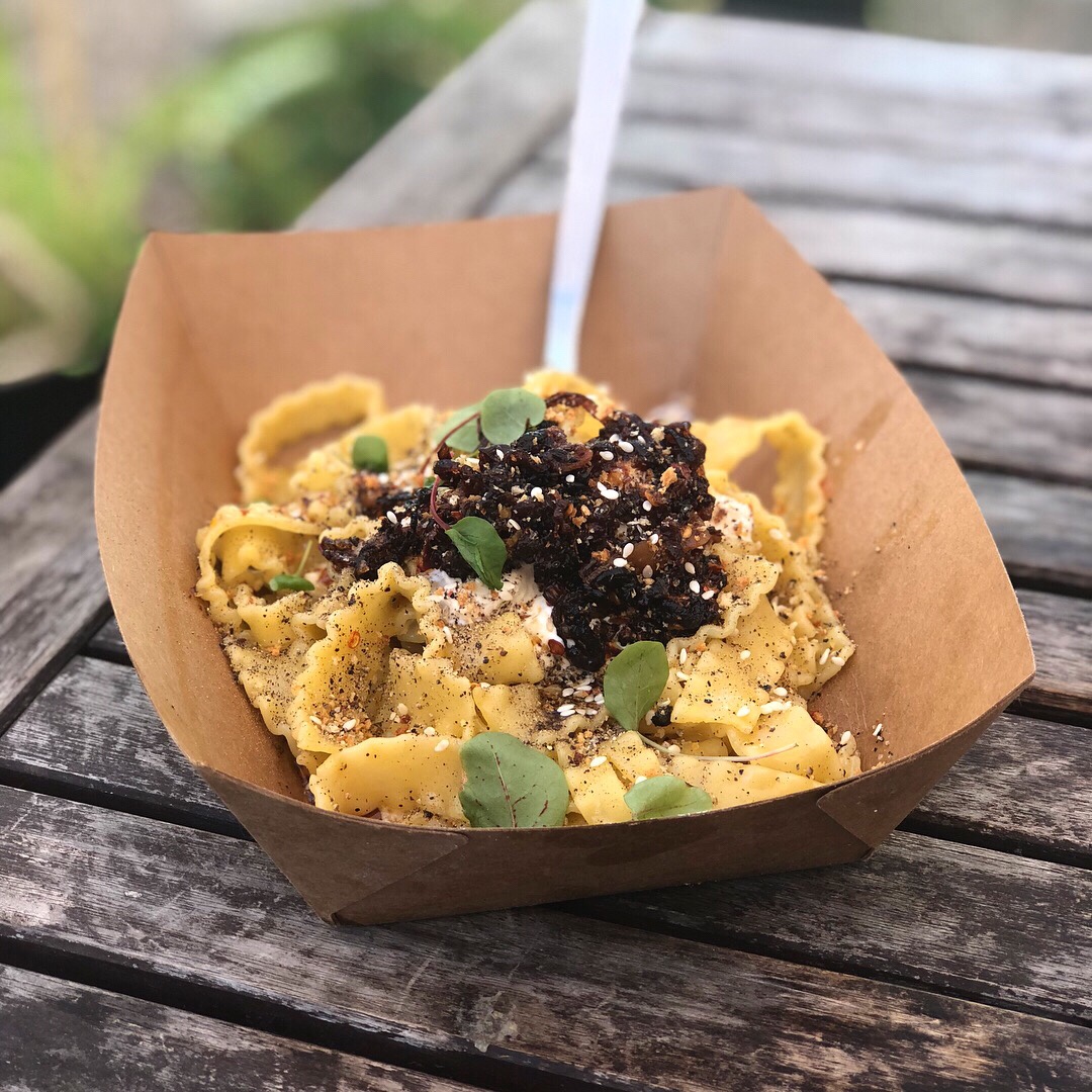Tagliatelle tossed with tempered egg yolk in the style of carbonara. Topped with cart-made burrata, fried shallots, spicy chili oil, sumac, lemon and sesame seed bread crumbs. $14