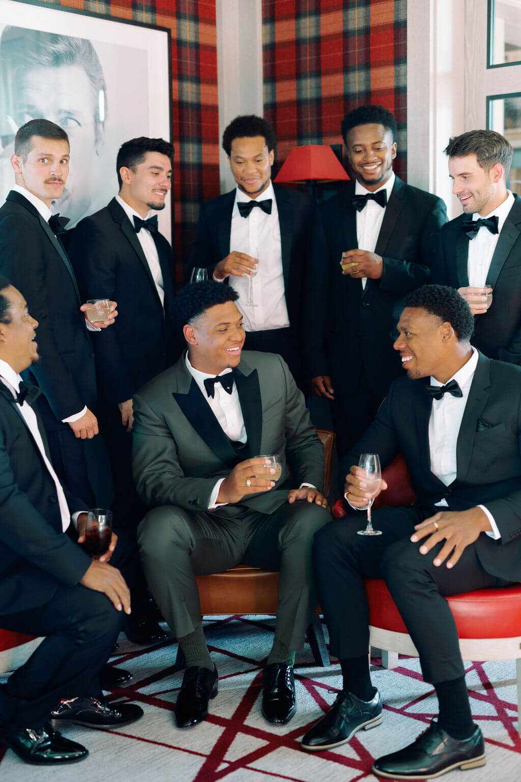 groom and groomsmen sitting