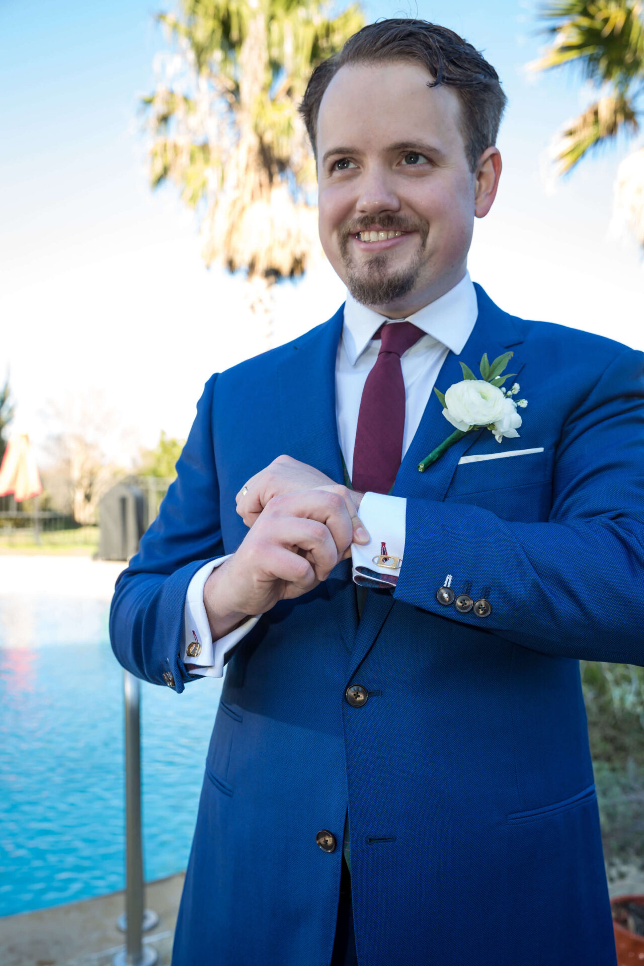 Blue suit with red tie
