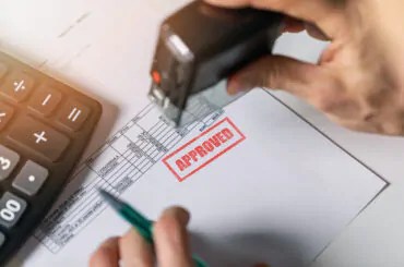 tender acceptance - hand put a approved stamp on financial bill