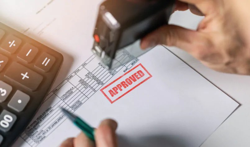 tender acceptance - hand put a approved stamp on financial bill