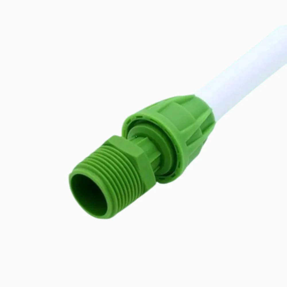 Distribuidor de riego NetaDrip con múltiples salidas y goteros de estaca para macetas.