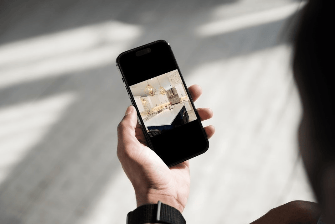 buyer's agent showing ChatGPT AI renovation mockup during home showing
