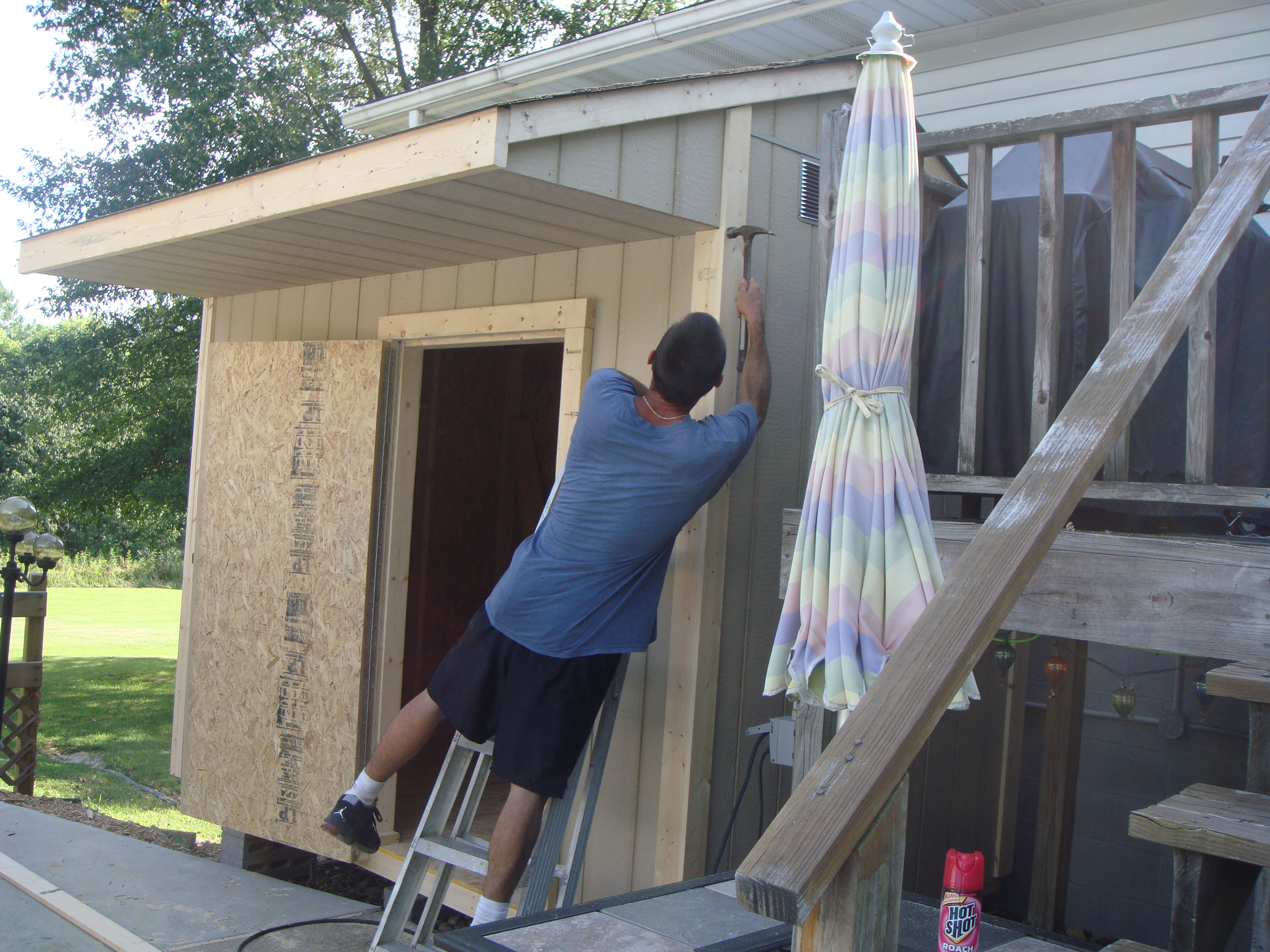 6x10 Barn House with 6x10 Porch incorporated into the rafters