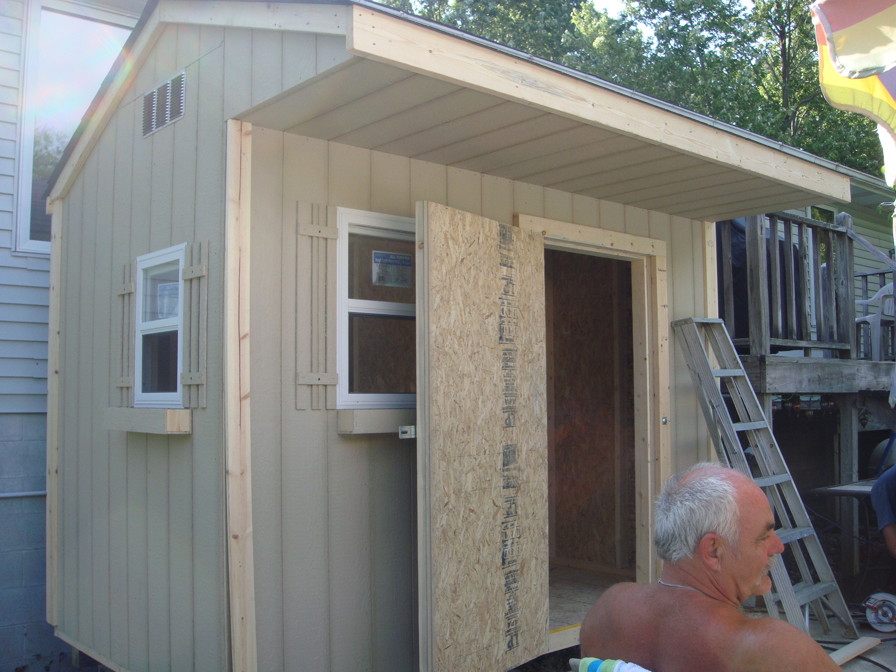 6x10 Barn House with 6x10 Porch incorporated into the rafters