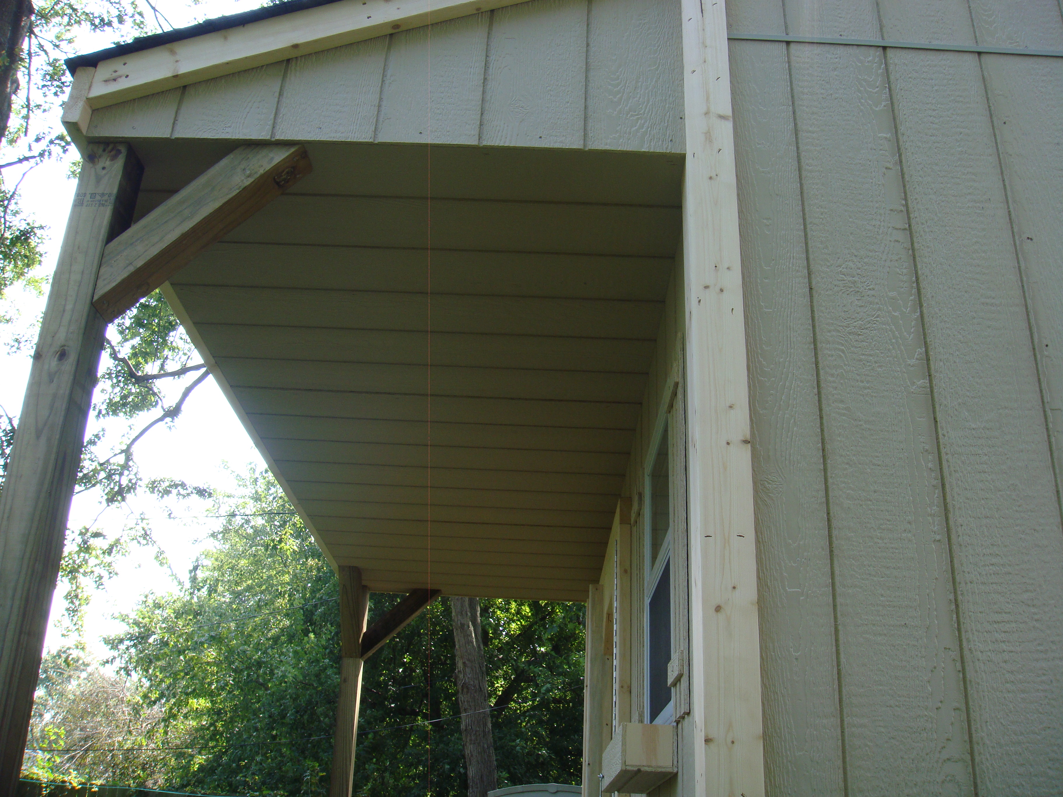 10x12x10Barn House with 4x12 Porch incorporated into the rafters