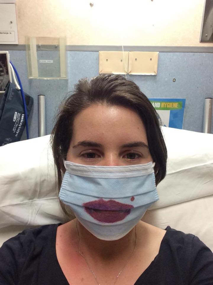 Drawing lips and a 'beauty spot' on my isolation mask