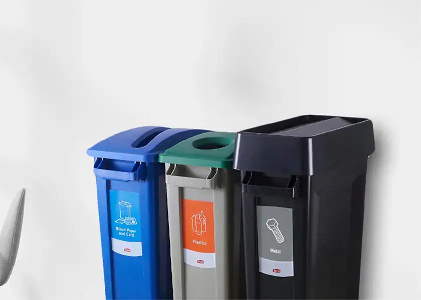 svelte Recycling bin station with color-coded containers for paper, plastics, and metals, promoting waste segregation and environmental sustainability in Asia.
