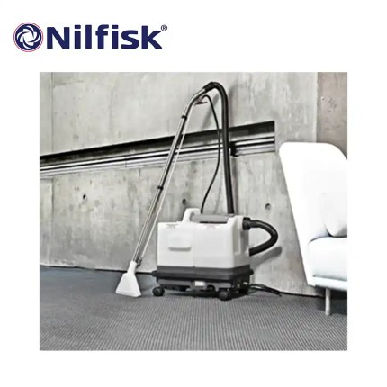 Nilfisk industrial vacuum cleaner cleaning an office space for hygiene and sanitation.