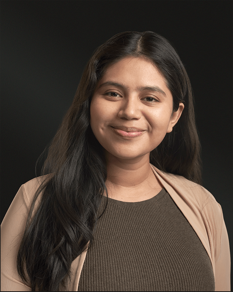 Professional corporate headshot of a female executive in NYC using cinematic soft-punch lighting by Big Apple Creative.