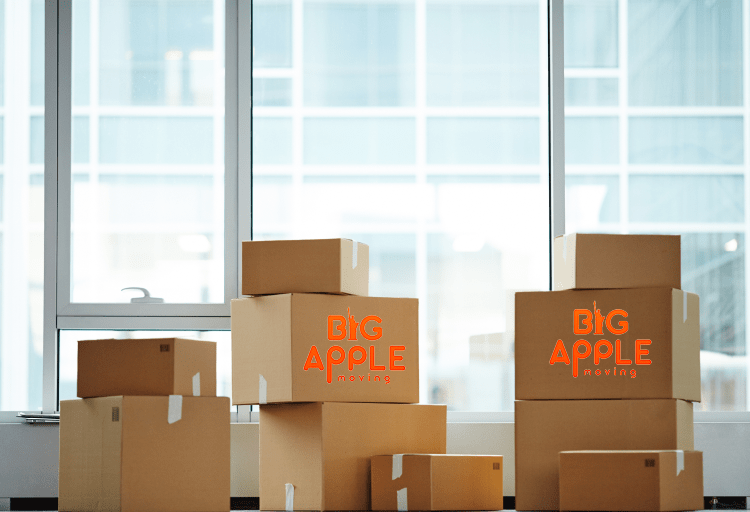 packed boxes with Big Apple Moving logo