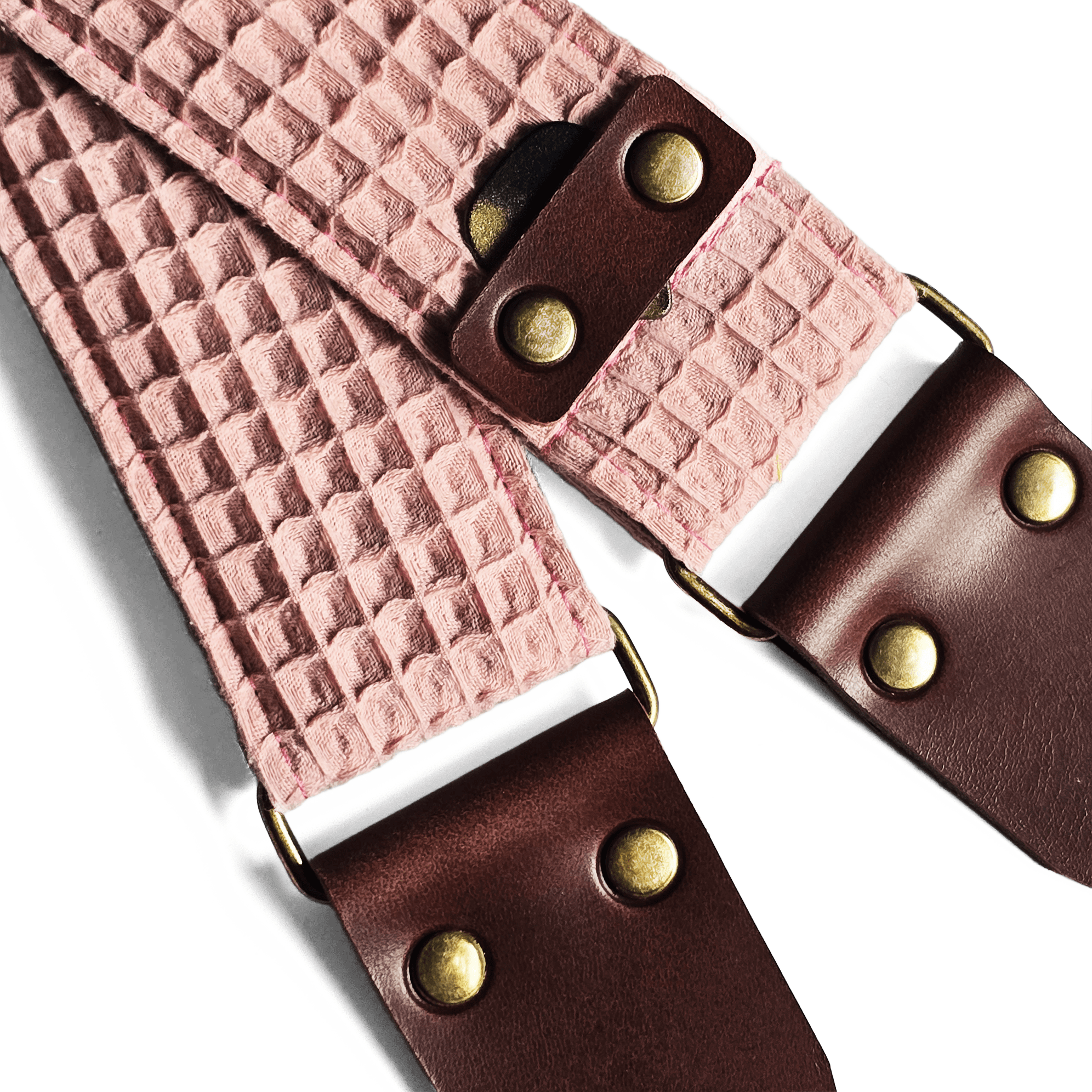 Pink guitar strap with pick holder