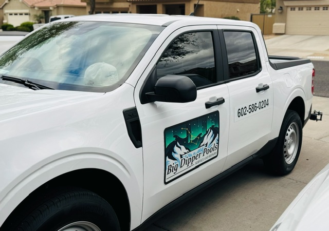 A certified Big Dipper Pools technician servicing a pool.
