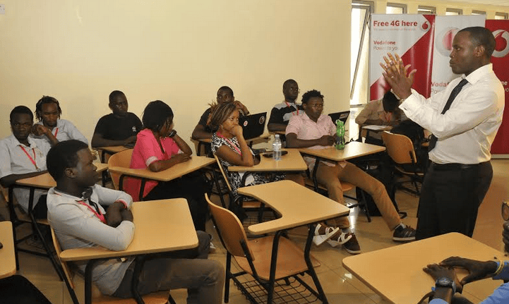 Vodafone Chief Technical Officer Derrick Sebbaale cheering a session during the Mozilla Festival that took at Victoria University on Sunday.