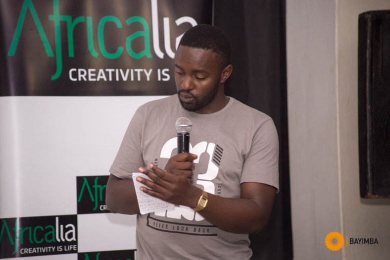 Polly Kamukama, the festival curator giving his remarks during the opening of the 2019 Amakula Film Festival.