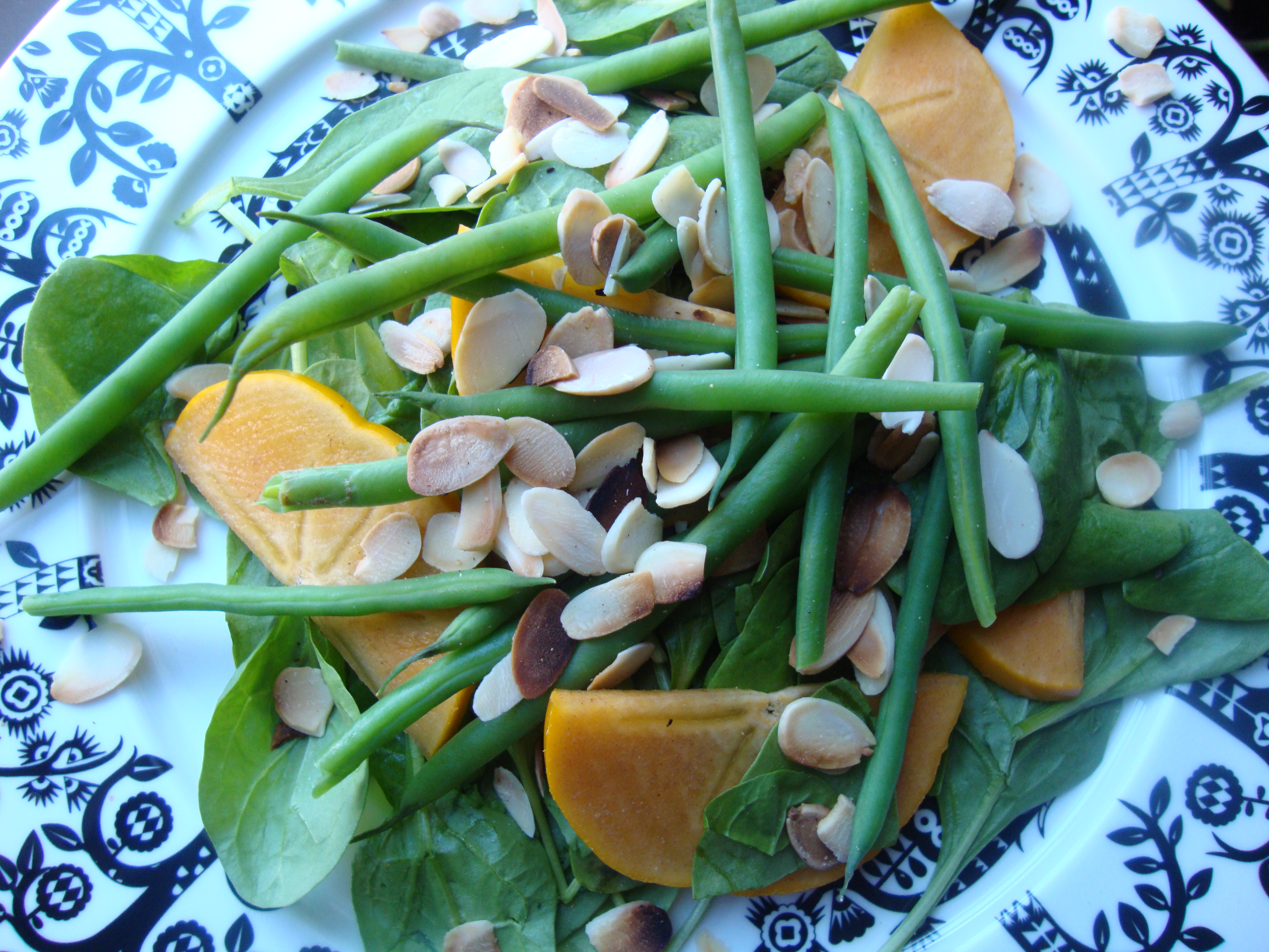 Spinach Salad with Fuyu Persimmons, Green Beans, Toasted Almonds and Spiced Vinaigrette https://bigsislittledish.wordpress.com/2011/11/04/spinach-salad-with-fuyu-persimmons-green-beanstoasted-almonds-and-spiced-vinaigrette/