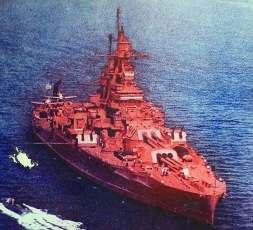 The USS Nevada was one tough battleship. It survived Pearl Harbor despite being hit by at least six bombs and one torpedo, and shooting down at least four