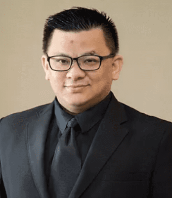 An Image of Alan Tan, the Director and CFO of Bimage Consulting