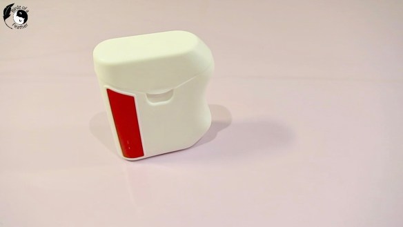 empty dental floss container for diy sewing kit