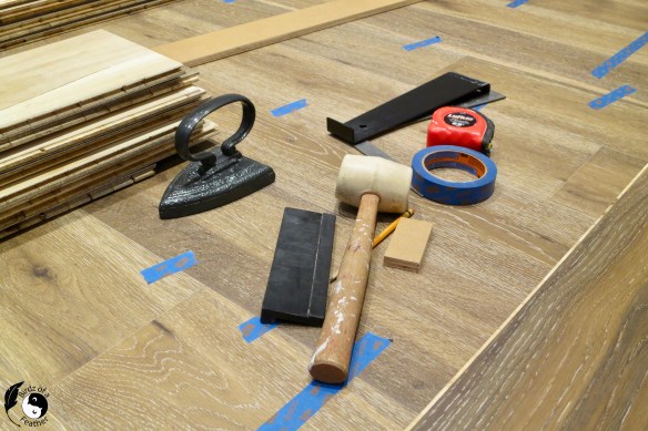 If you are considering installing real hardwood in a basement, an engineered hardwood floor should be your only consideration. Our tutorial explains how to install it the right way! Hardwood floor | Birdz of a Feather | hardwood floor diy | hardwood floor diy install | DIY | tips for installing hardwood floor #birdzofafeather.ca #hardwoodfloor #hardwoodfloorinstallation