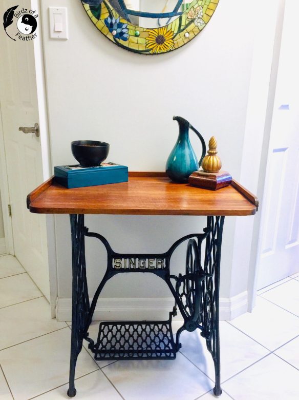 The finished sewing table with top and decor items on top for how to use gemstone mousse