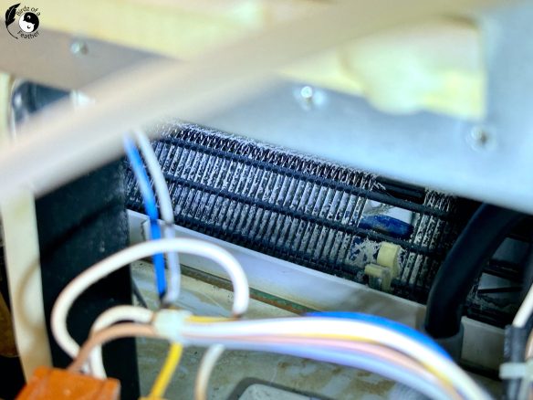 Dusty grills in back of fridge