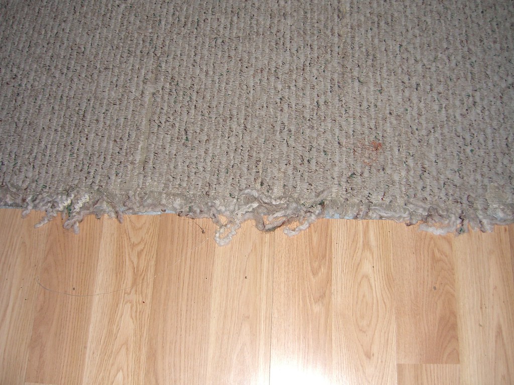 Replacing carpet with laminate. replacing carpet