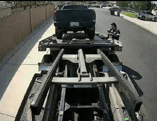 Bital Services technician completing a rollback tow truck camera and cable installation