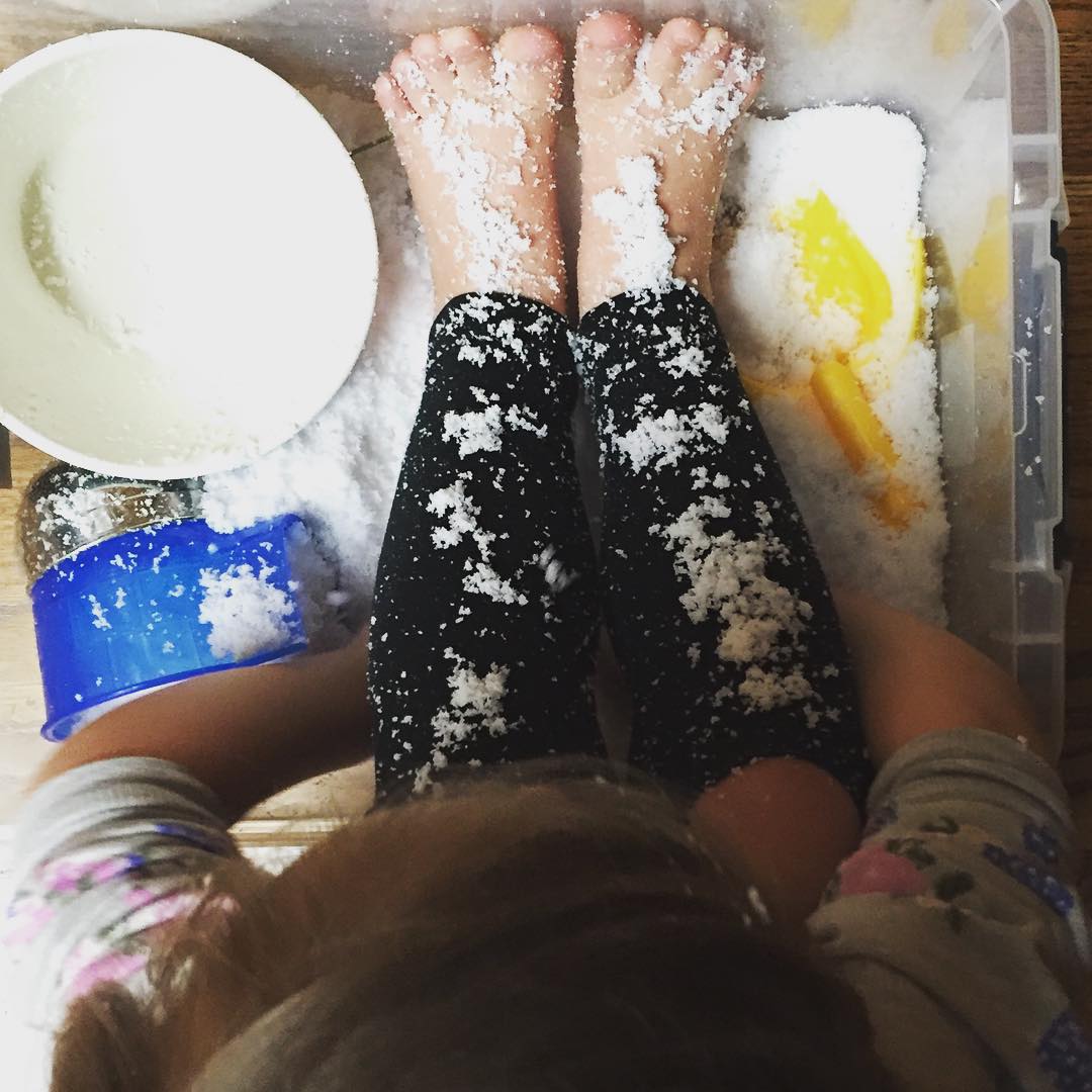 indoor sensory play in snow during dinner time