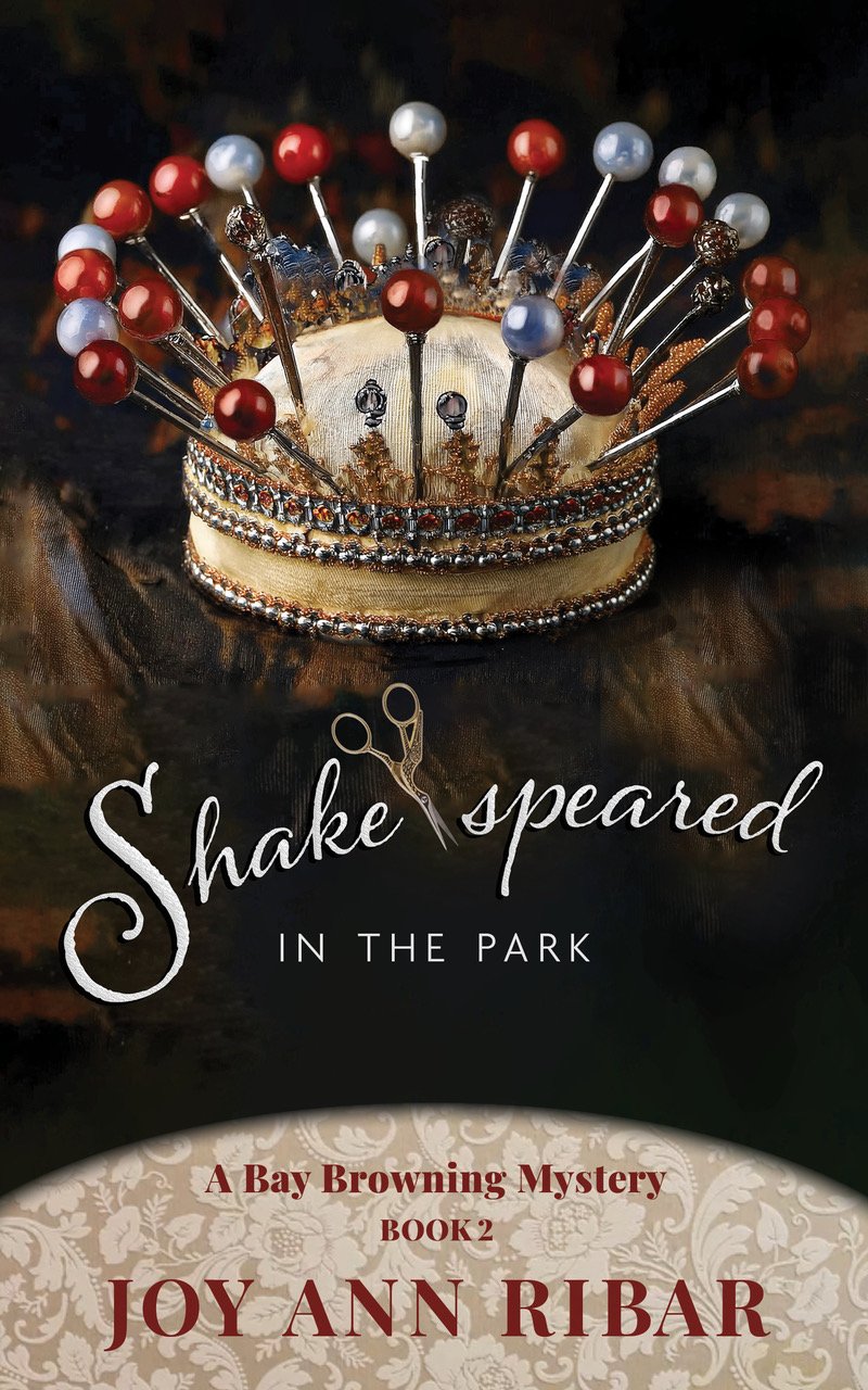 book cover for Shakespeared - picture of a crown and scissors.