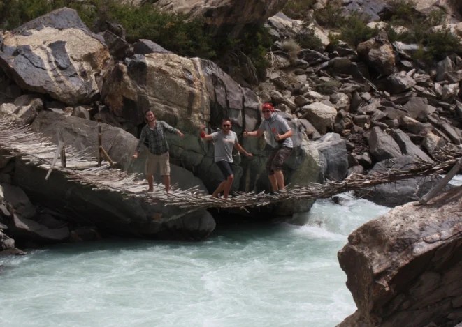 3 People Bridge over Rapids 