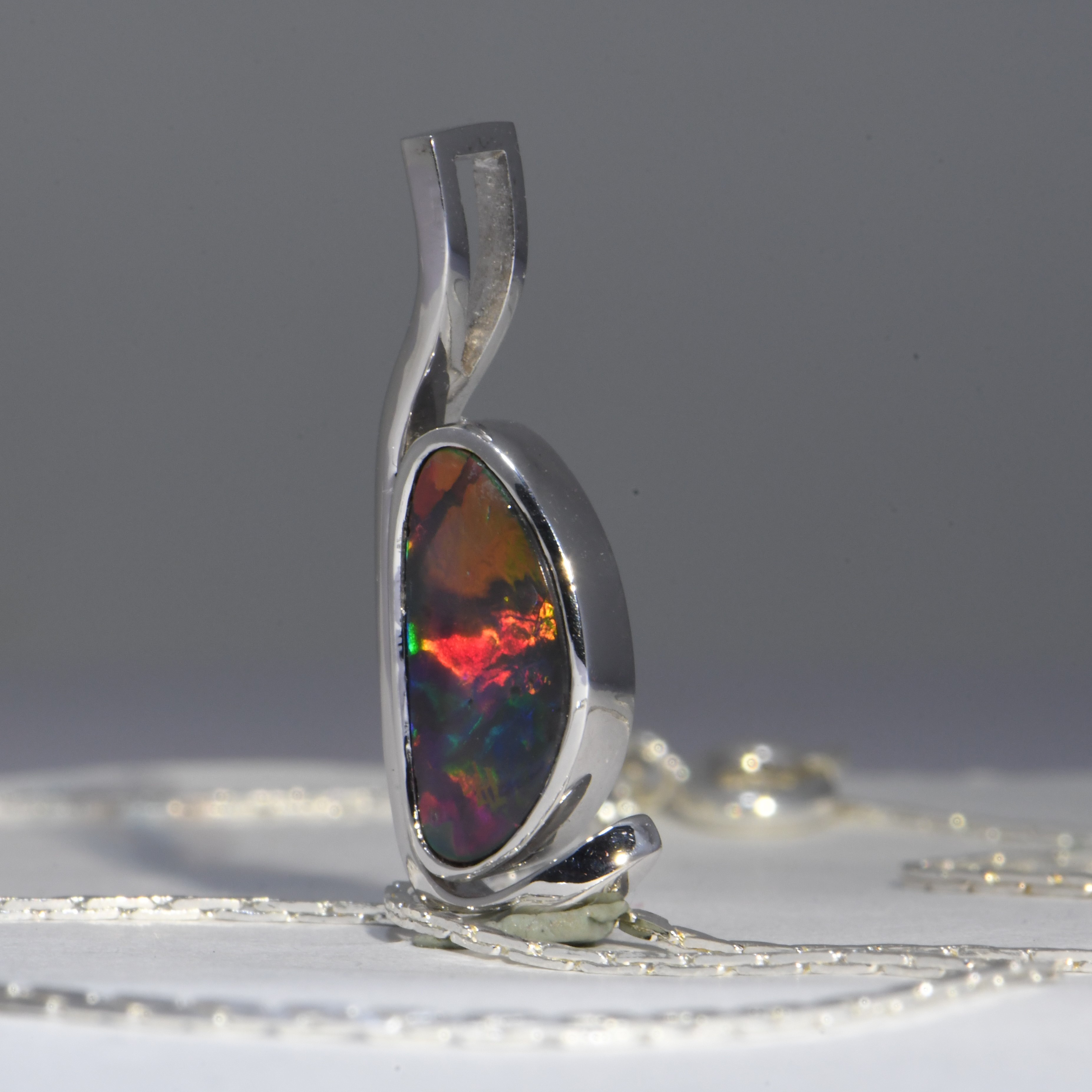 Solid Black N1 Opal from Lightning Ridge set in 18 CT White