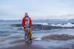 Splitboard standing norwegian beach