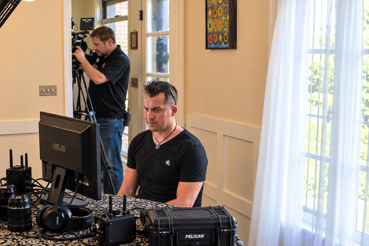 Jason Montney at the production monitor on set