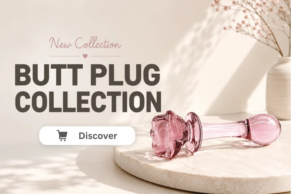 Minimalist promotional banner featuring a pink glass butt plug on a marble pedestal with the text "Butt Plug Collection" and "Shop Now" on a soft beige background