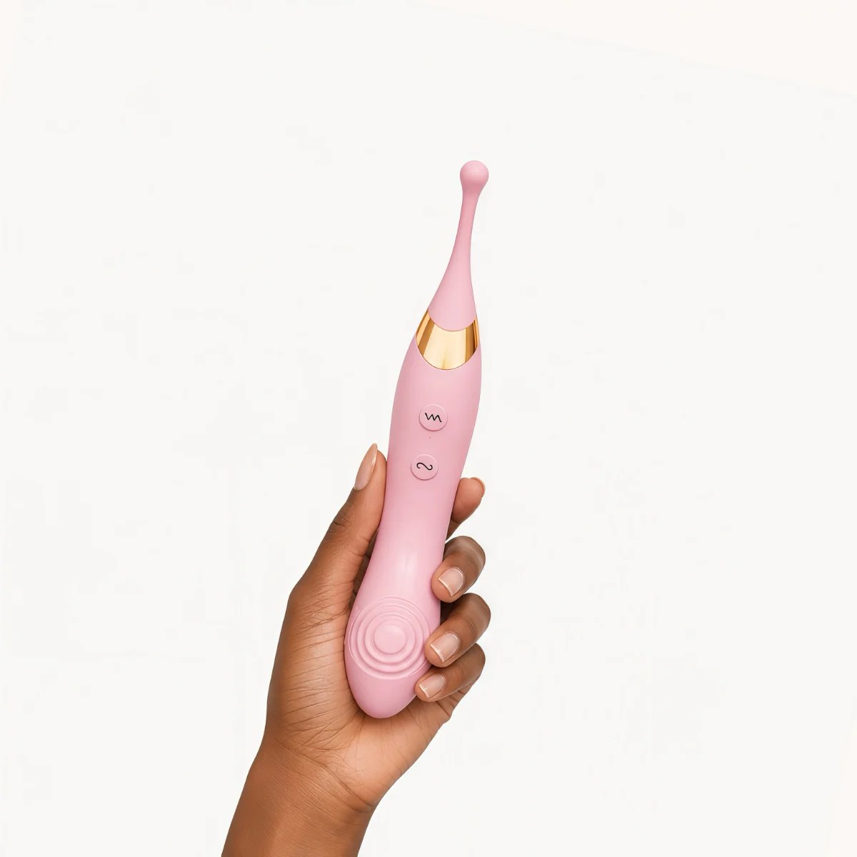 Hand showcasing DuoRush™ vibrator against a light grey background.