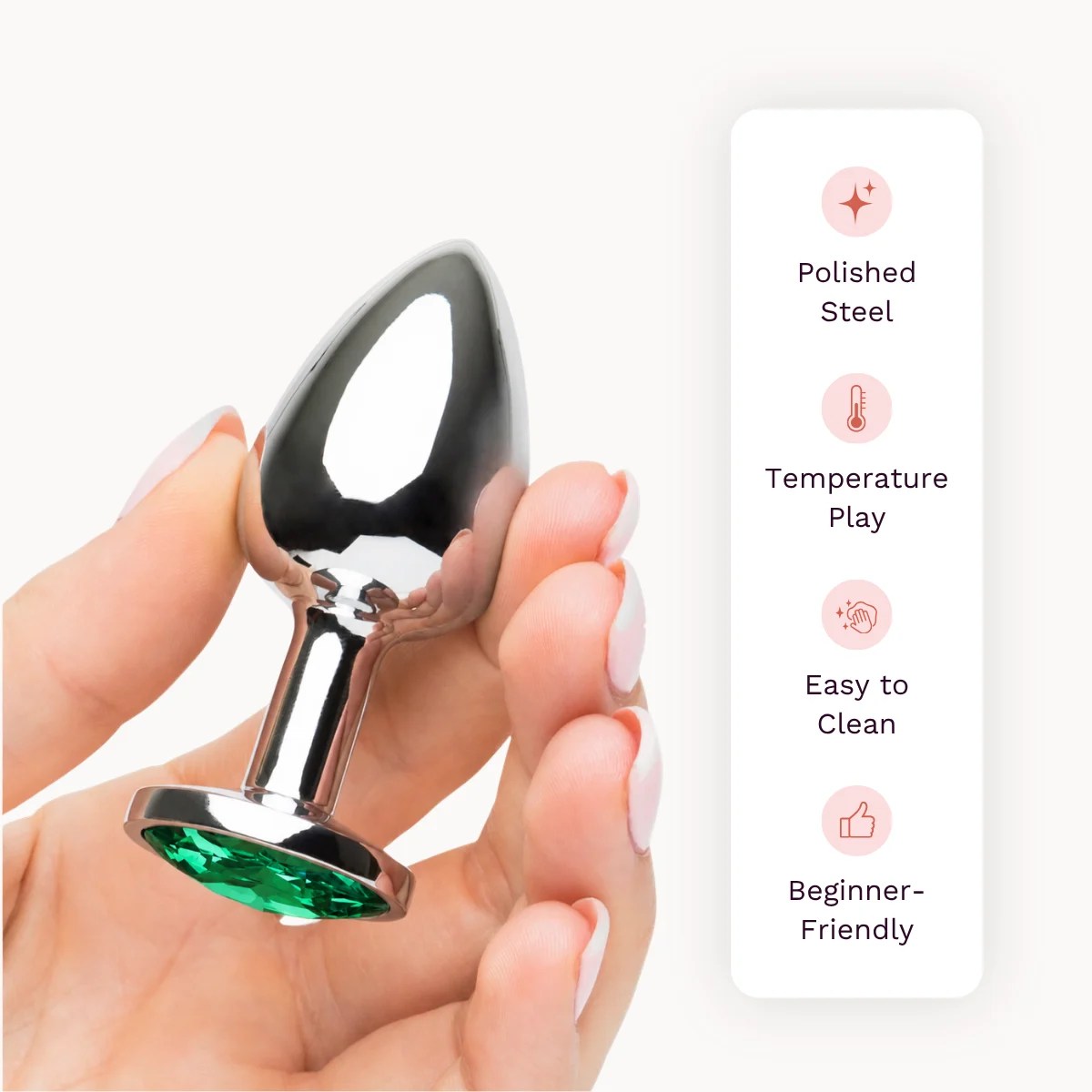 A hand holding Jade plug small