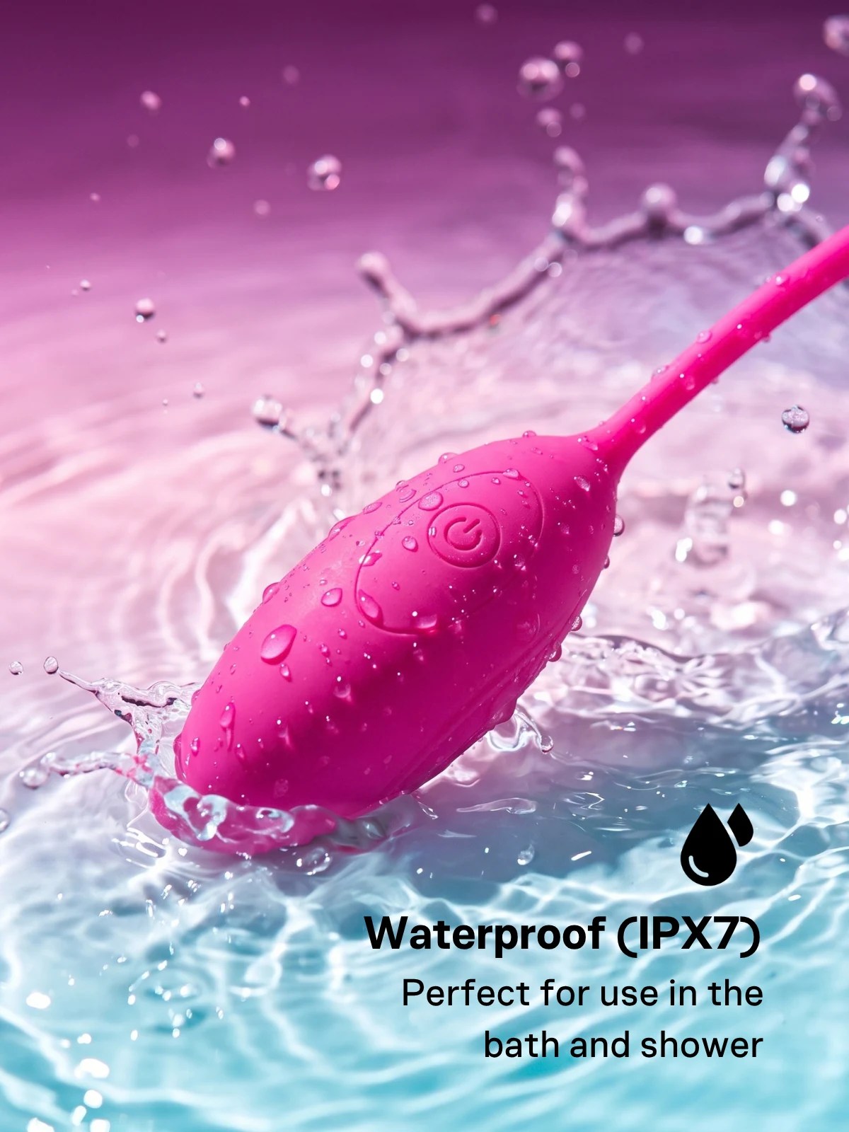 Lover Link IPX7 waterproof wearable vibrator in bright pink silicone, covered in water droplets and shown splashing in water.