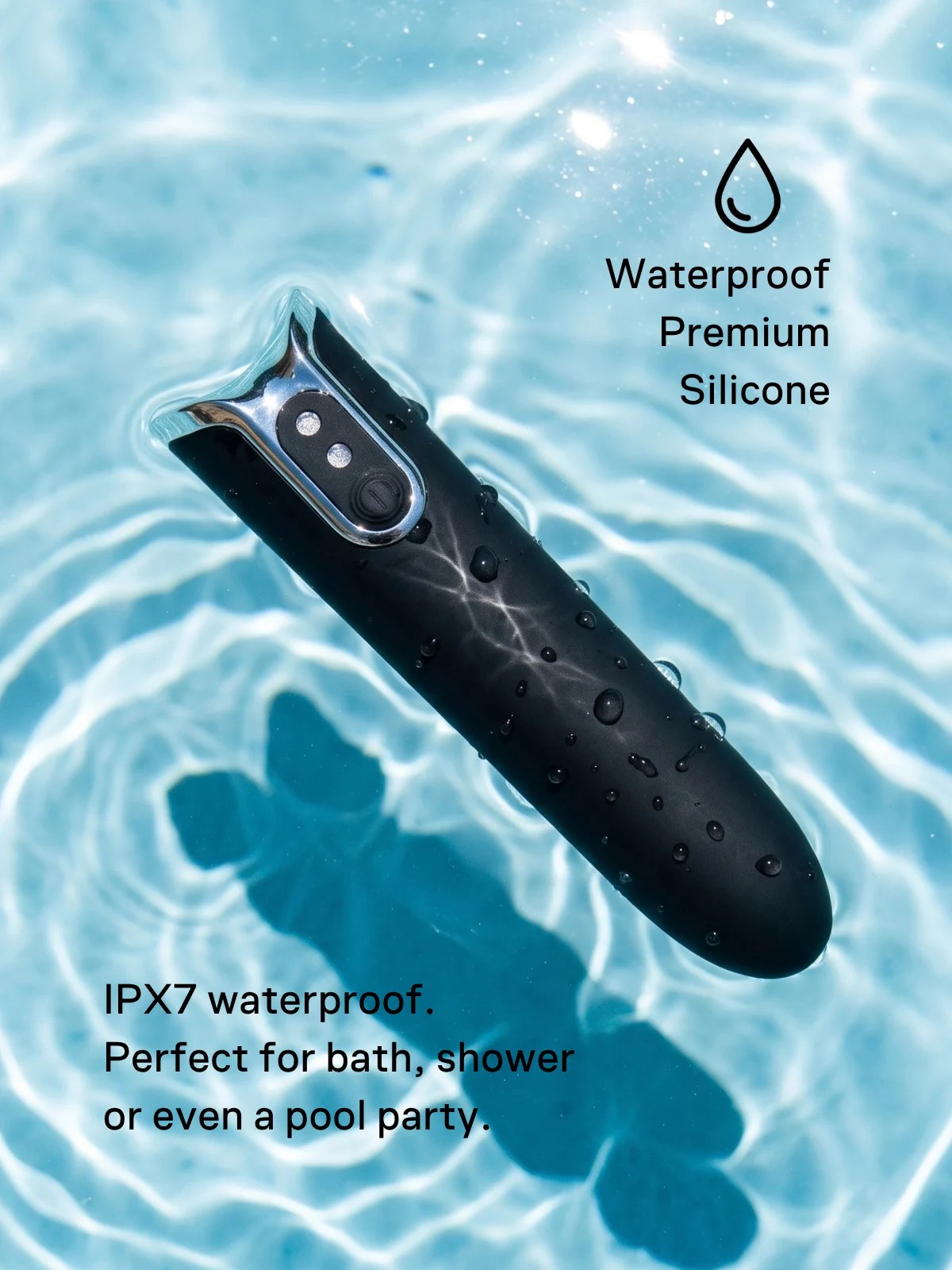 Lumi IPX7 waterproof bullet vibrator made from premium black silicone, covered in water droplets and shown in water.